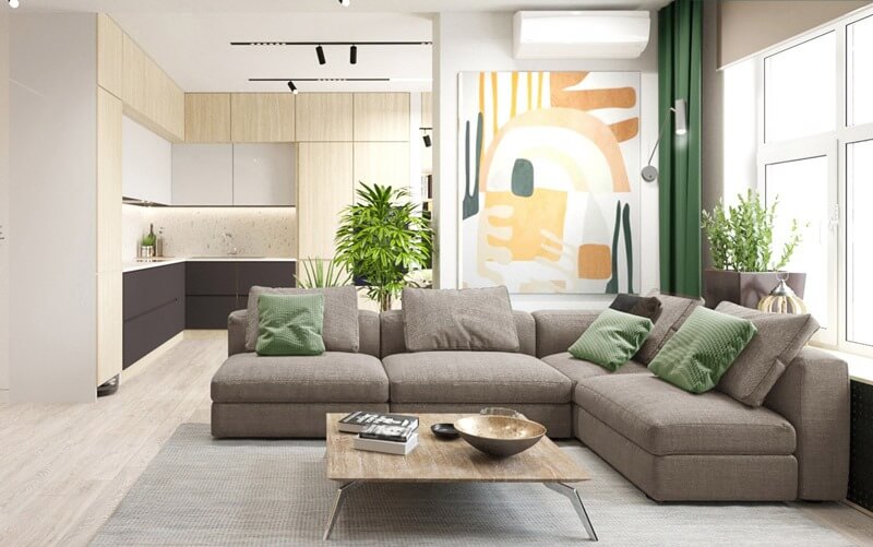 Phòng khách hiện đại với sofa xám, tranh treo tường, cây xanh và cửa sổ lớn, nội thất tối giản và tiện nghi.