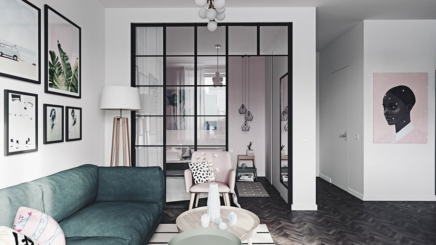 Phòng khách hiện đại với ghế sofa xanh, tranh treo tường và cửa kính lớn, nội thất sang trọng.