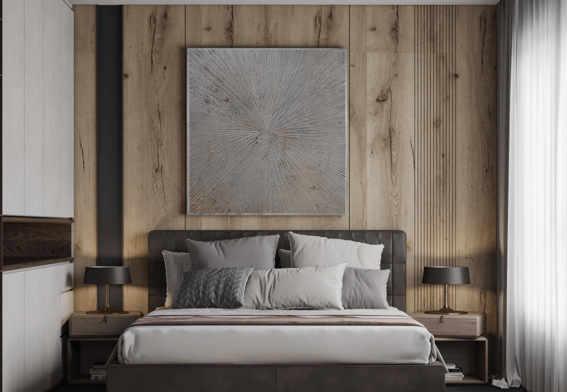 Phòng ngủ hiện đại với giường nệm, tranh treo tường và đèn bàn, tạo cảm giác ấm cúng và sang trọng.