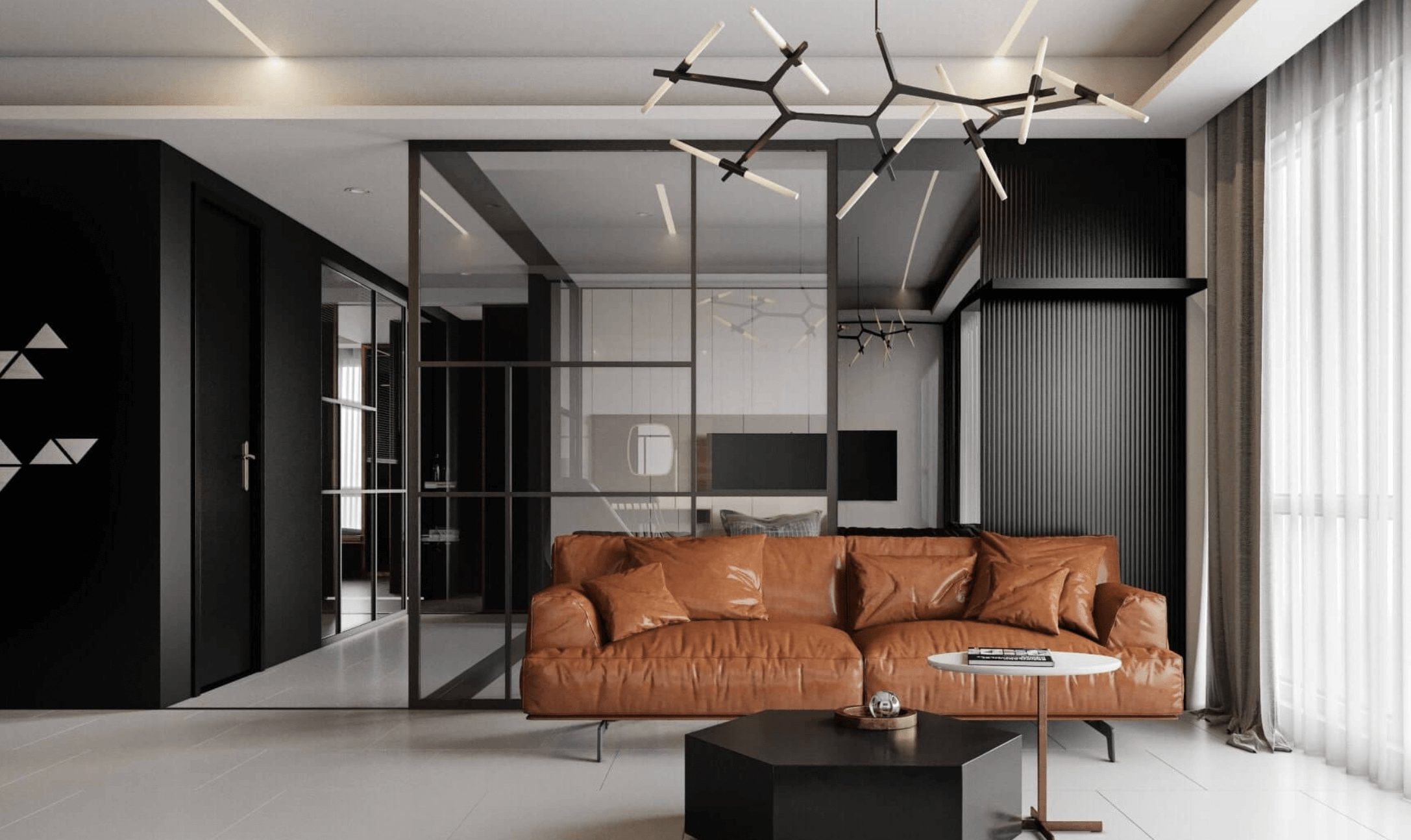 Phòng khách hiện đại với sofa da nâu, bàn cà phê nhỏ và đèn trần độc đáo.