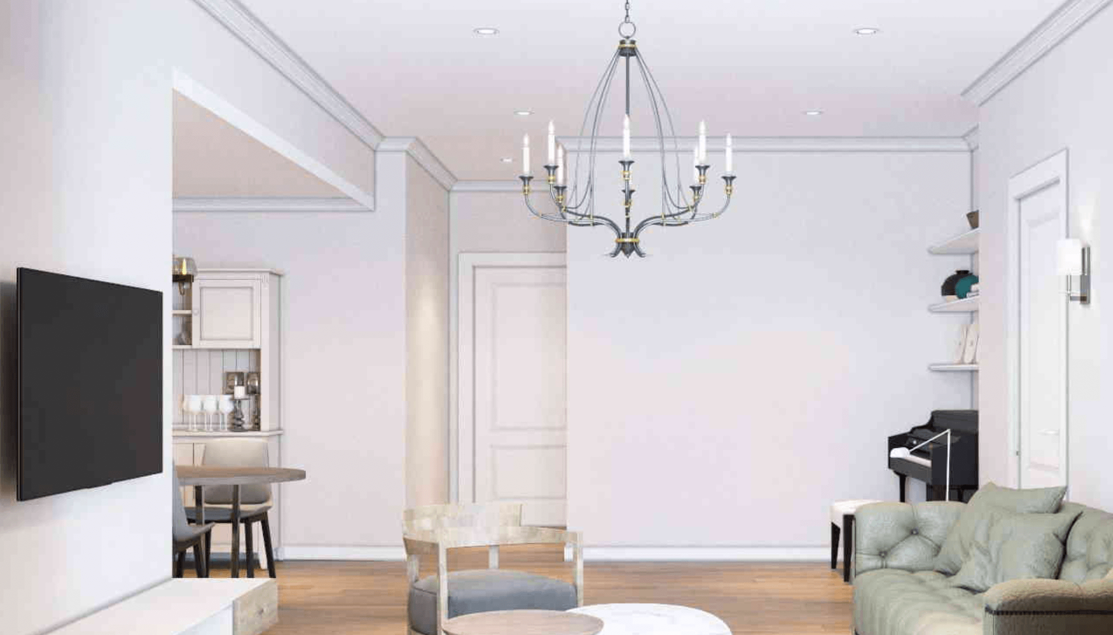 Phòng khách hiện đại với đèn chùm, sofa xanh nhạt, bàn tròn và kệ sách cao.