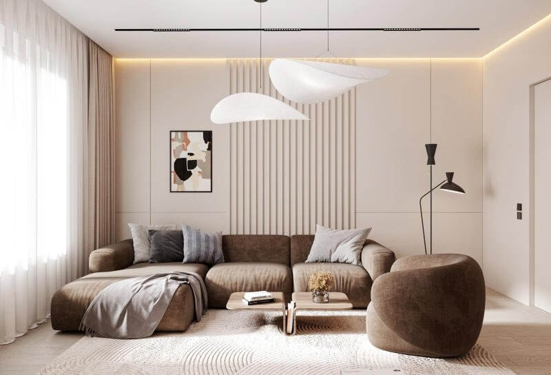 Phòng khách hiện đại với sofa nâu, đèn trang trí, tranh treo tường và nội thất tối giản.