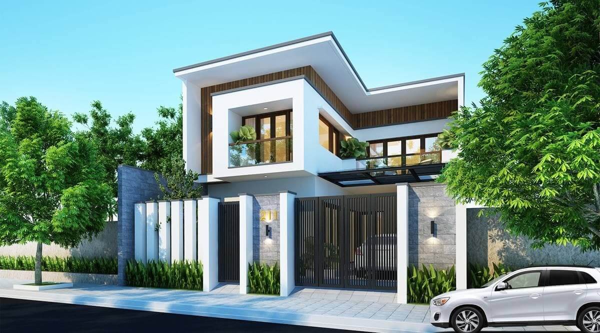 Ngôi nhà hiện đại với mái dốc, cửa sổ lớn và cây xanh xung quanh, xe hơi trắng đỗ phía trước.