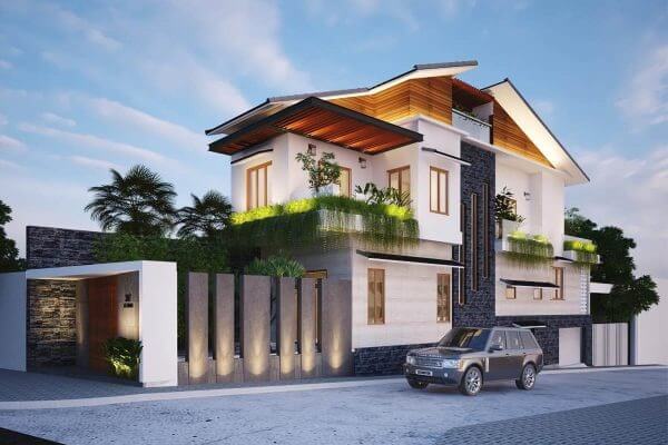 Biệt thự hiện đại với thiết kế sang trọng và ô tô đỗ trước nhà trong cảnh hoàng hôn.