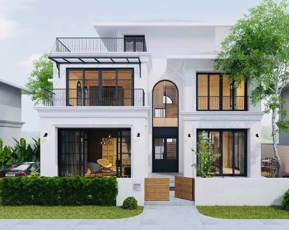 Ngôi nhà biệt thự hiện đại 3 tầng, cửa sổ lớn, sân vườn xanh mát, thiết kế sang trọng và tinh tế.