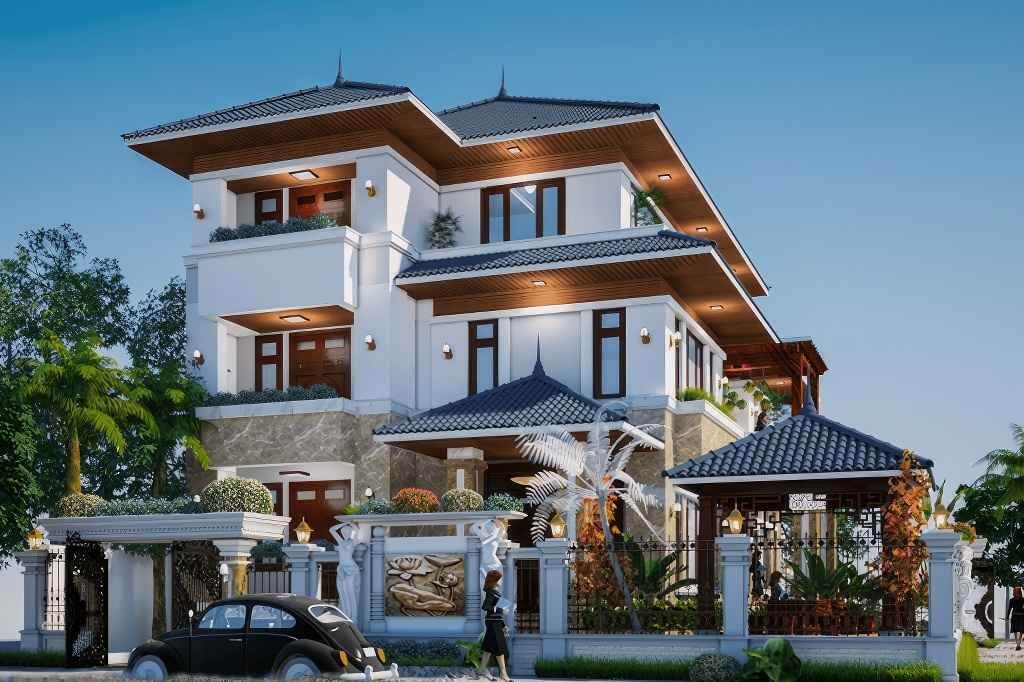 Biệt thự sang trọng với thiết kế hiện đại và mái ngói màu xanh, xung quanh cây xanh xanh tươi dưới bầu trời trong.