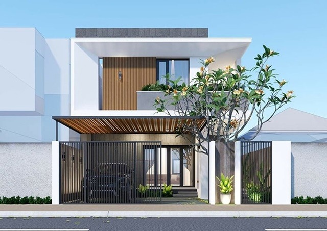 Nhà phố hiện đại với hai tầng, cây xanh trang trí phía trước, tường trắng, cửa kính và cổng sắt màu đen.