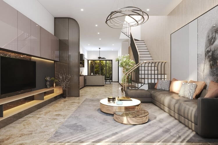 Phòng khách hiện đại với ghế sofa xám, bàn tròn, kệ tivi, và cầu thang xoắn ốc trong không gian thoáng đãng.
