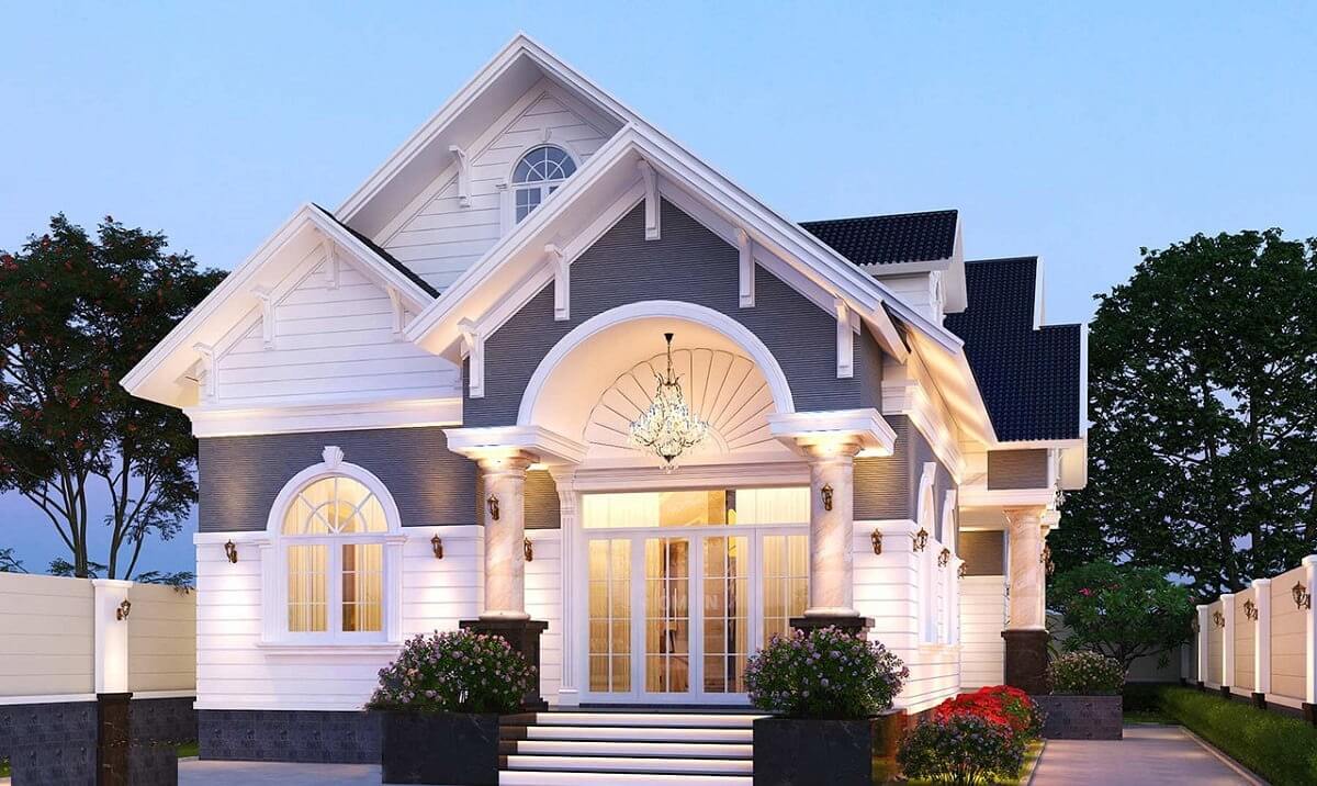 Nhà phố kiểu châu Âu hiện đại với mái vòm, trang trí đèn chùm sang trọng, cảnh quan ban đêm ấn tượng.