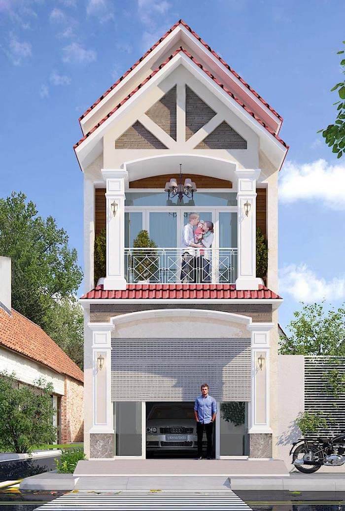 Ngôi nhà hai tầng hiện đại với ban công và gara ô tô, gia đình đứng trên ban công, bầu trời xanh mây trắng.