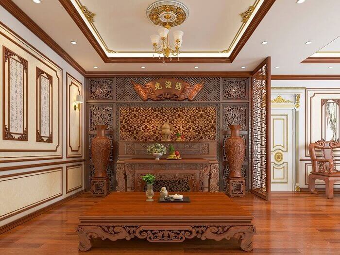 Phòng thờ truyền thống với bàn ghế gỗ, lư hương và bình hoa trang trí tinh xảo.