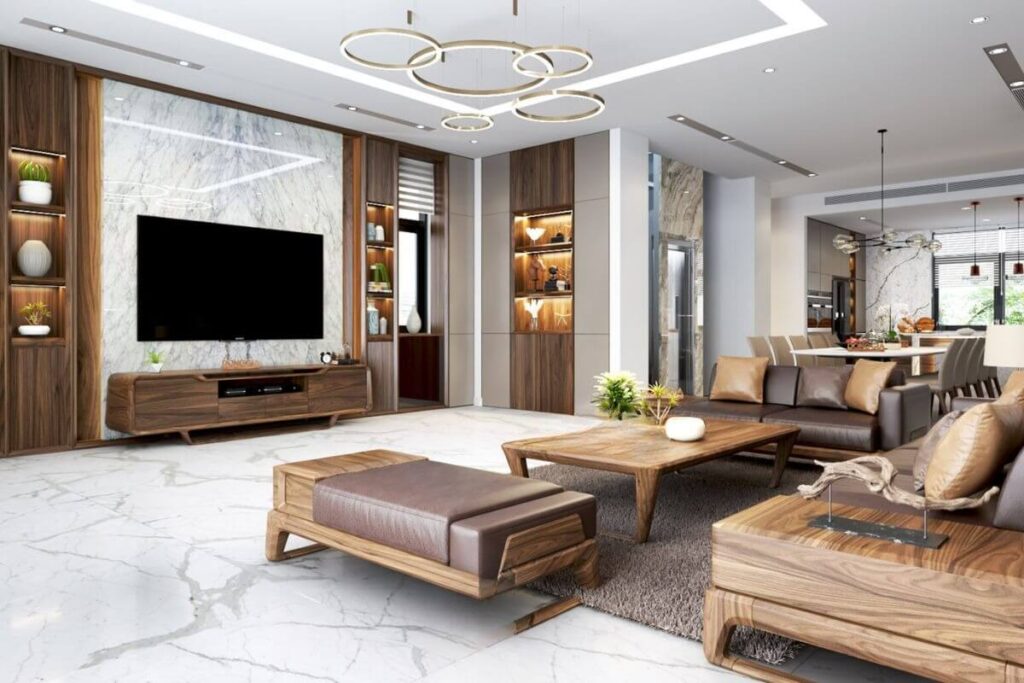 Phòng khách sang trọng với nội thất gỗ hiện đại, bàn ghế sofa, và tivi treo tường.