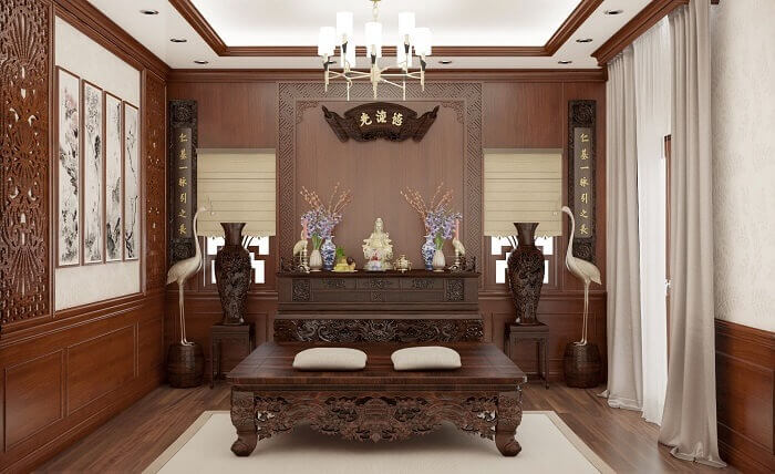 Phòng thờ trang trí nội thất gỗ sang trọng với bàn thờ, lọ hoa, và tranh treo tường mang phong cách truyền thống.