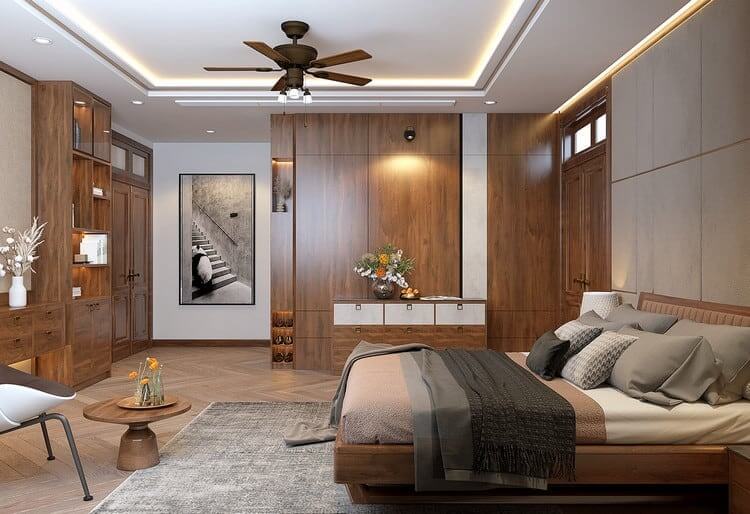 Phòng ngủ hiện đại với nội thất gỗ sang trọng, giường, đèn trần và trang trí tường tối giản.