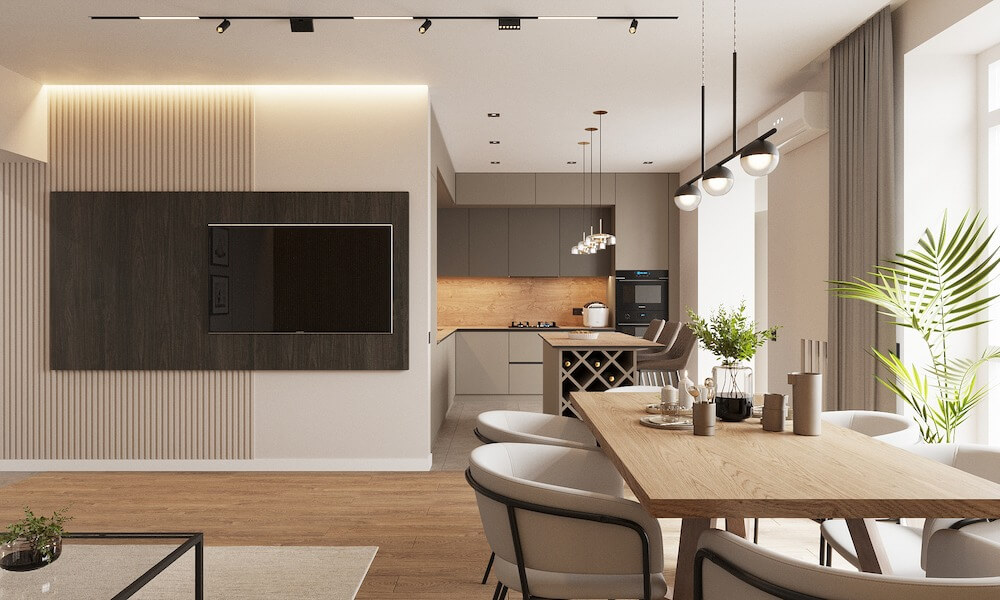 Phòng ăn hiện đại với bàn gỗ lớn, đèn treo, và cây trang trí xanh, nội thất tối giản, ánh sáng tự nhiên.