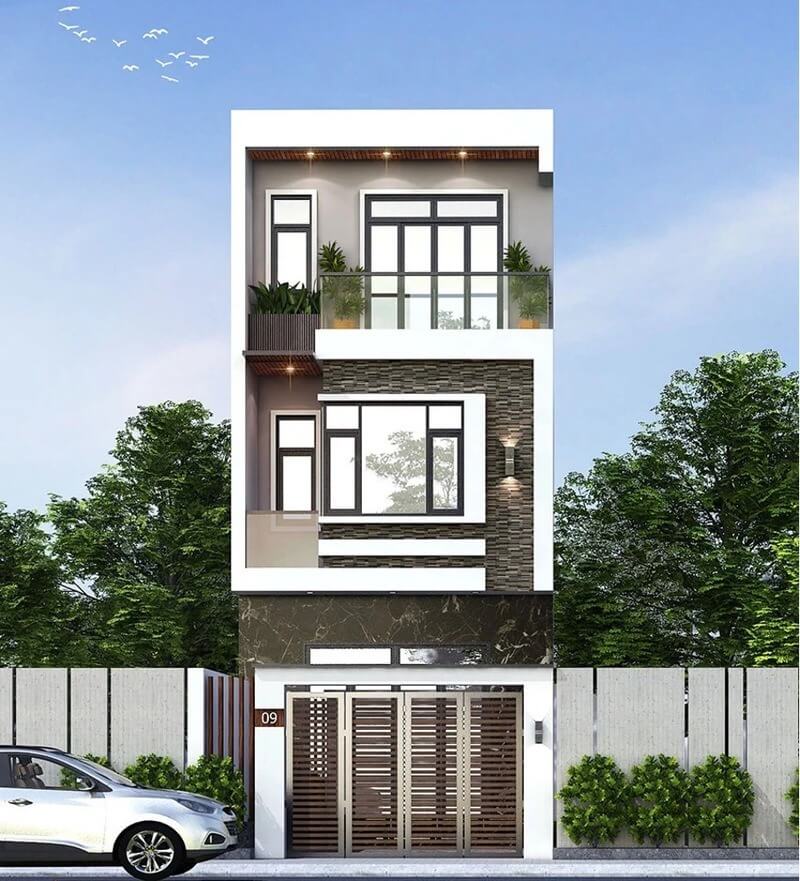 Nhà phố hiện đại 3 tầng với kiến trúc tối giản, màu trắng chủ đạo, cây xanh bao quanh và ô tô đỗ phía trước.