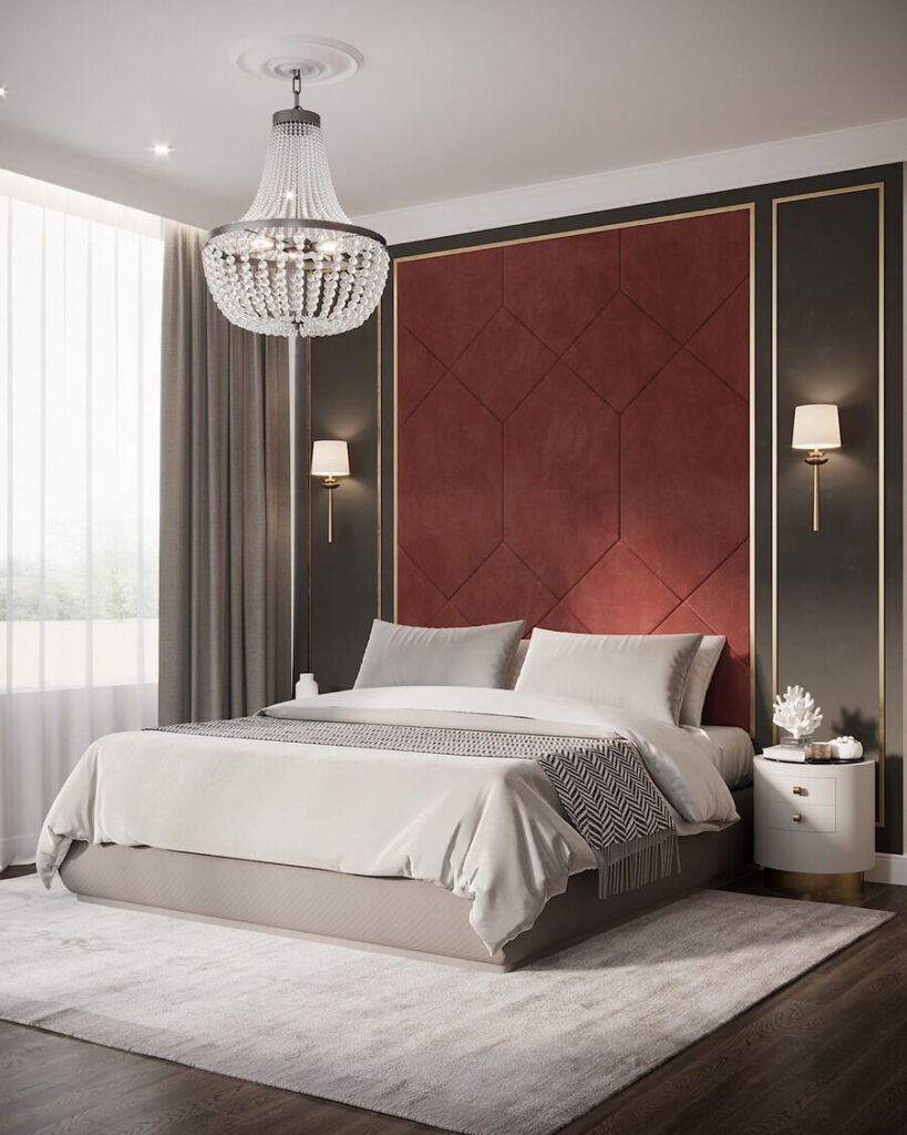 Phòng ngủ sang trọng với đèn chùm pha lê, giường trắng, tường đỏ và cửa sổ lớn.