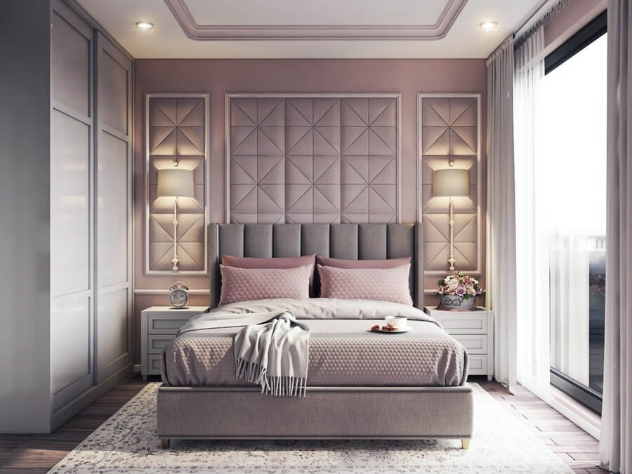 Phòng ngủ sang trọng với giường nệm hồng pastel, đèn ngủ và cửa sổ lớn đón ánh sáng tự nhiên.