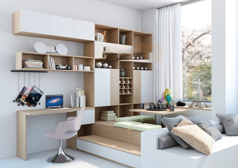 Phòng khách hiện đại với không gian làm việc và kệ sách, thiết kế sáng tạo, ánh sáng tự nhiên qua cửa sổ lớn.