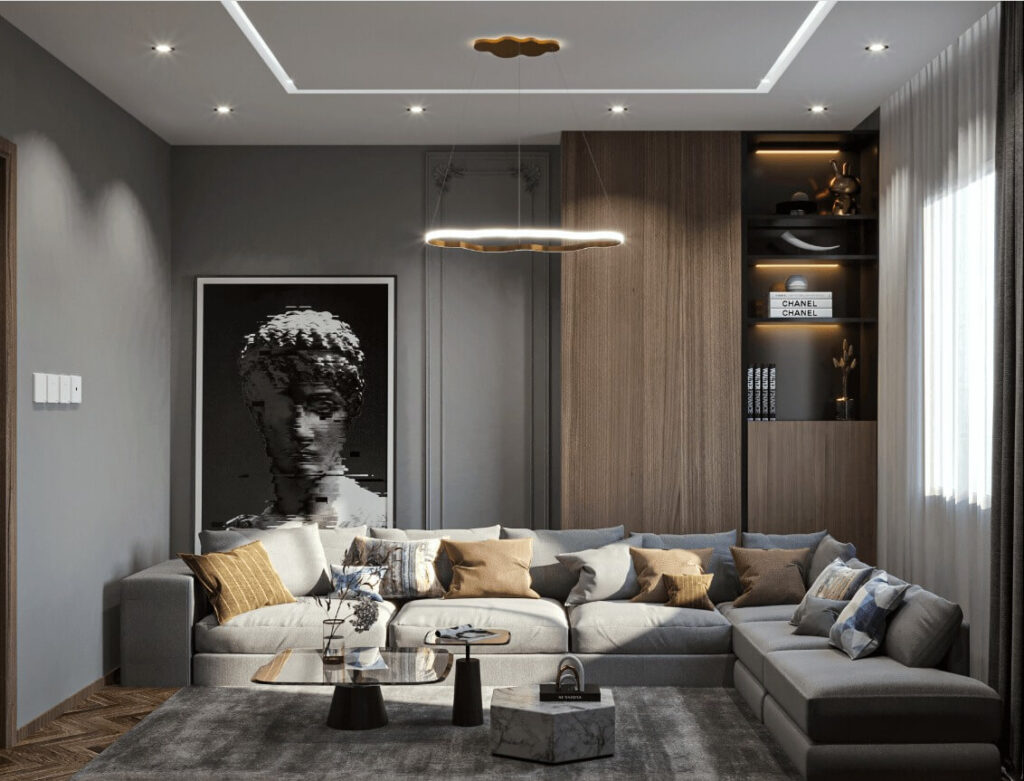 Phòng khách hiện đại với ghế sofa xám, tranh nghệ thuật và kệ trang trí, ánh sáng tự nhiên.