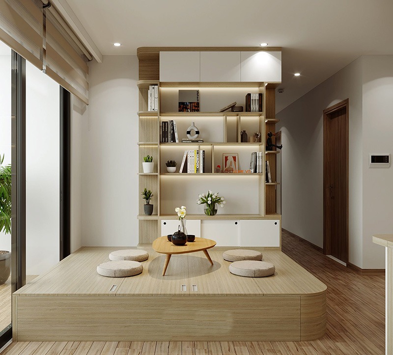 Phòng khách hiện đại với bàn trà gỗ, kệ sách trang trí và ánh sáng tự nhiên.