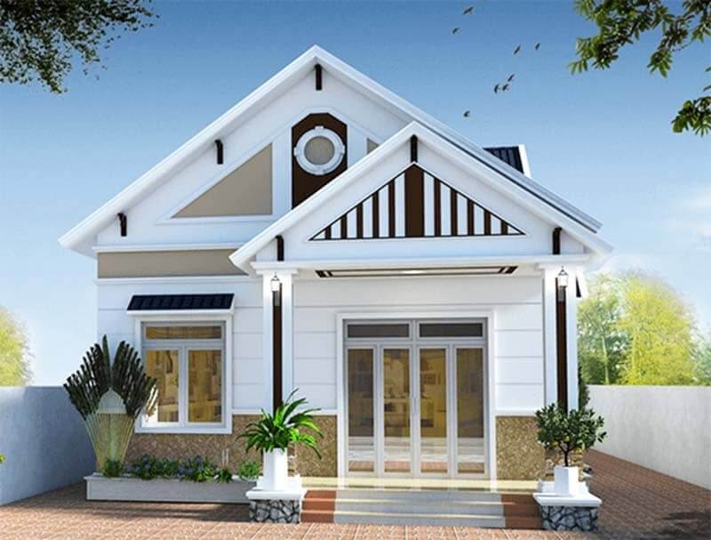 Nhà một tầng hiện đại với mái màu trắng, sân gạch đỏ và cây xanh trước nhà. Trời trong xanh, chim bay trên cao.