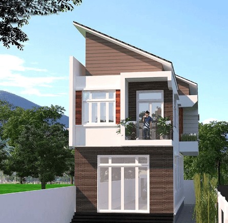 Nhà hiện đại hai tầng với thiết kế mái dốc và ban công, bao quanh bởi cây xanh.