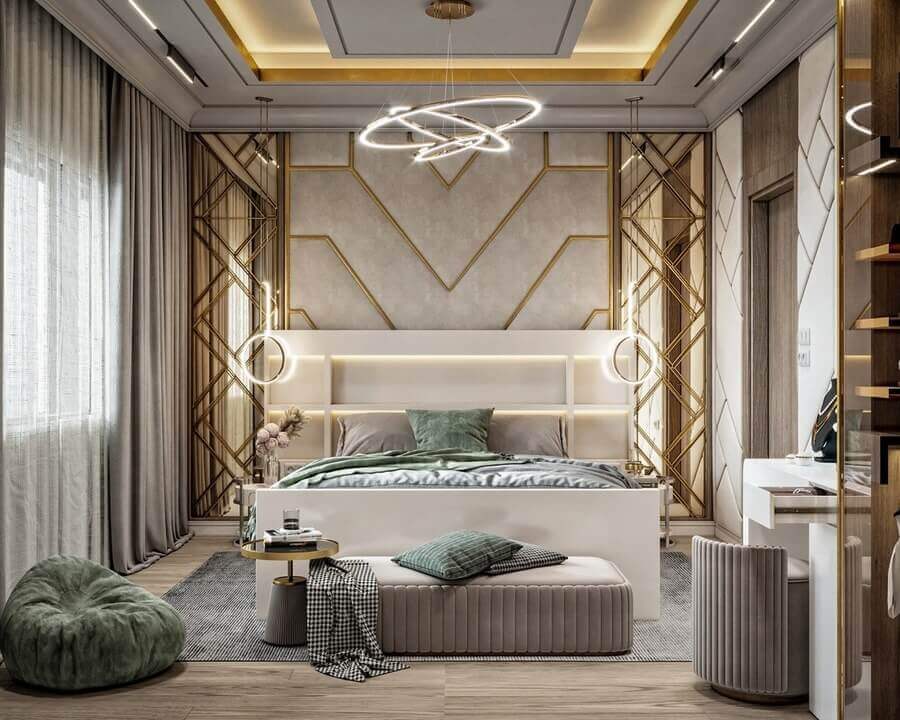 Phòng ngủ sang trọng với đèn trần hiện đại, giường lớn, ghế màu xanh lá, và tường trang trí tinh tế.