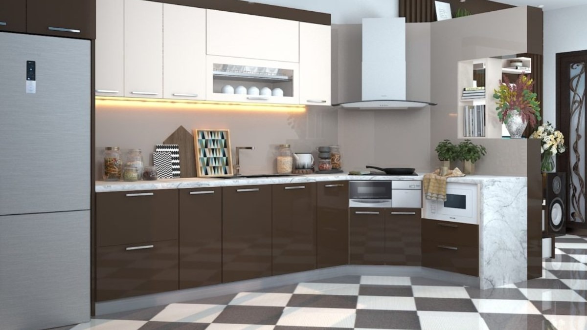 Căn bếp hiện đại với tủ gỗ màu nâu nhạt, bếp điện và lò vi sóng, trang trí bằng cây xanh và bình hoa.