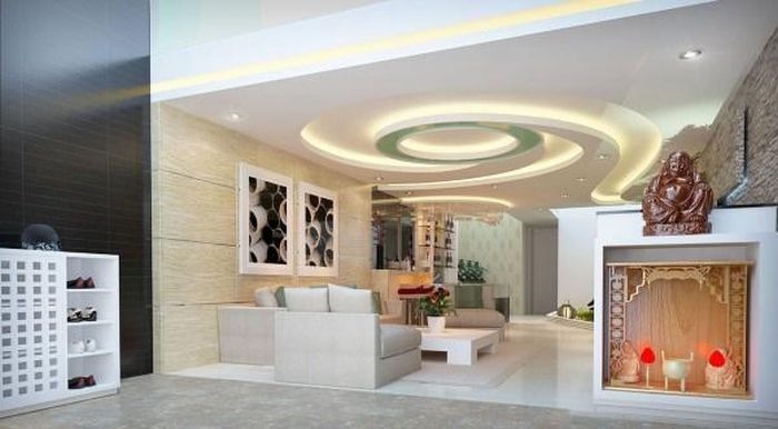 Phòng khách phong cách hiện đại với trần nhà ánh sáng LED, sofa trắng và bàn gỗ, bàn thờ trang trí độc đáo.