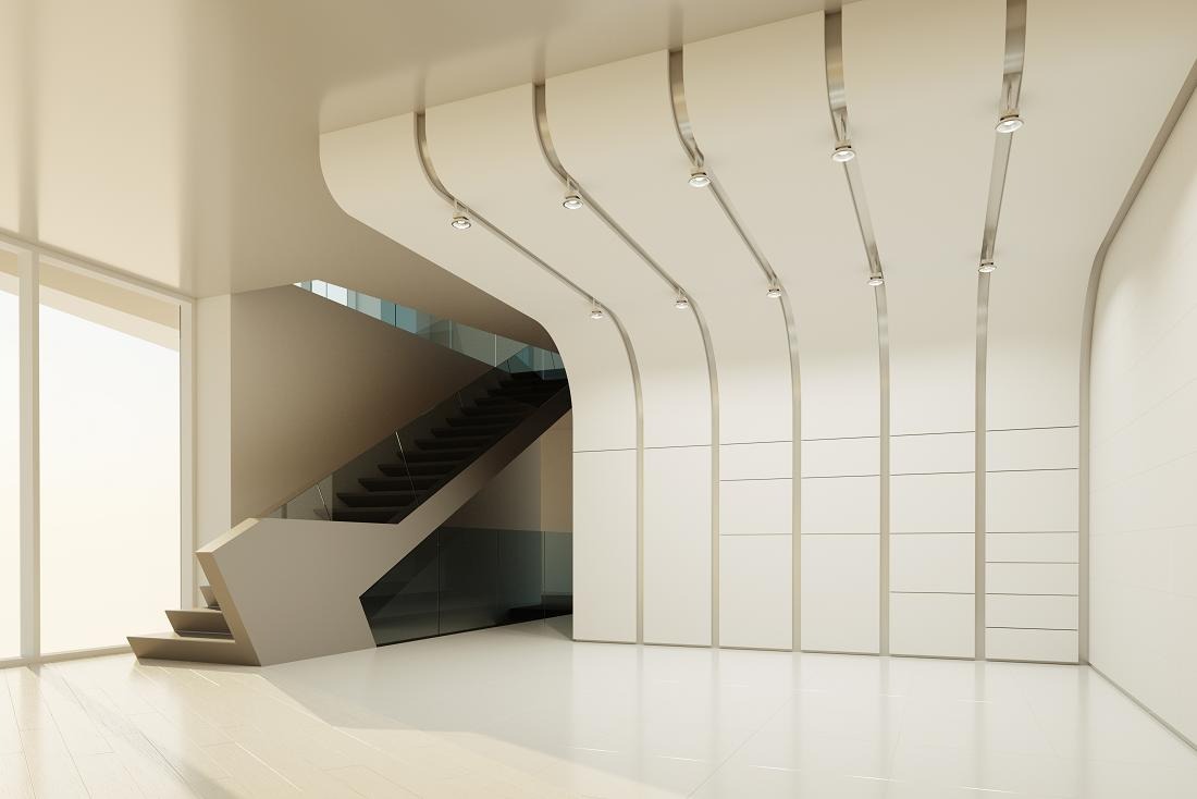 Cầu thang hiện đại trong không gian tối giản với thiết kế trần uốn cong và ánh sáng tự nhiên.