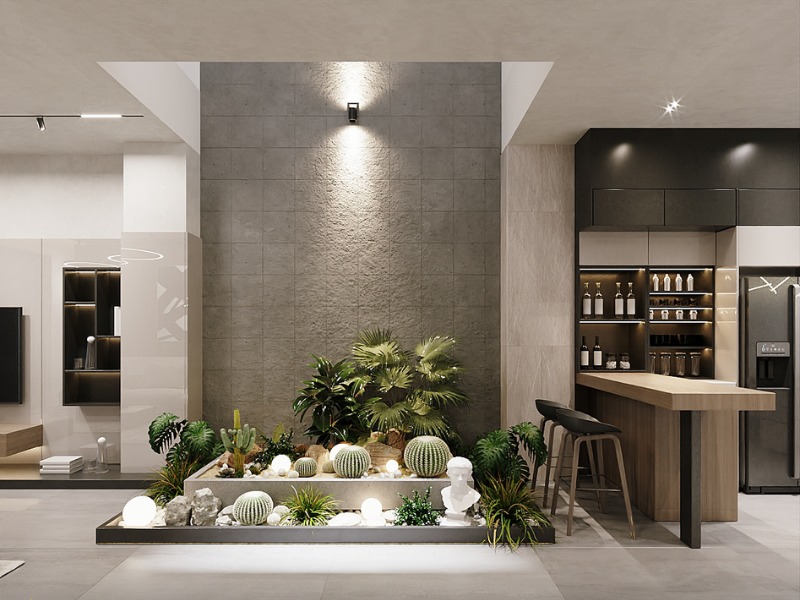 Khu vườn trong nhà hiện đại với cây xương rồng và đèn, cạnh quầy bar và tủ rượu.