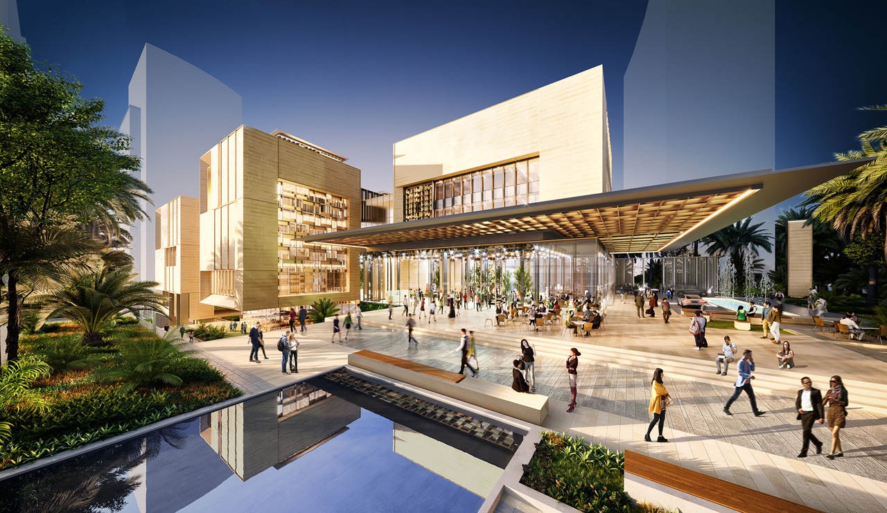 Tòa nhà hiện đại với không gian ngoài trời rộng rãi và cây xanh, nhiều người đi lại và thư giãn.