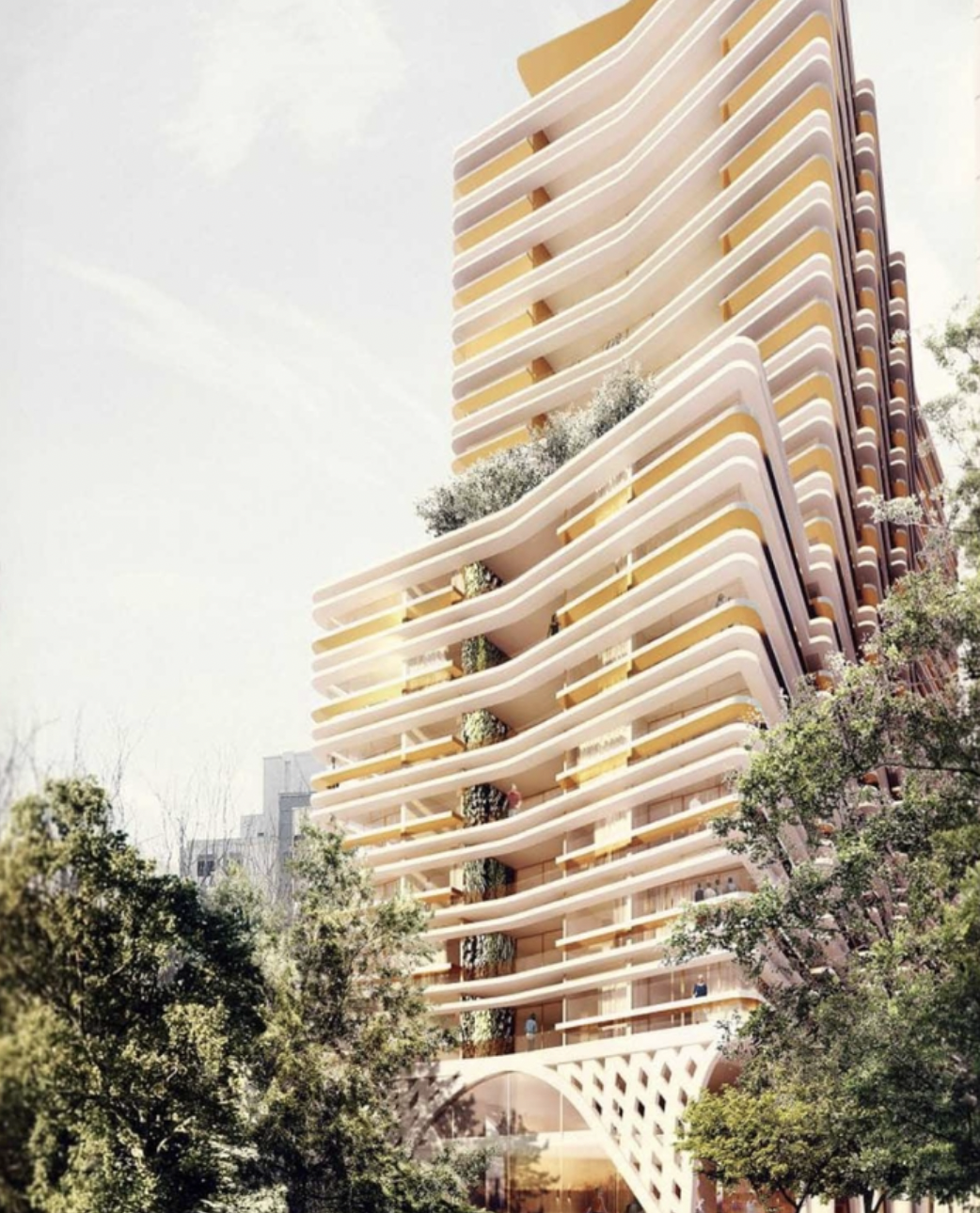 Tòa nhà cao tầng hiện đại với kiến trúc độc đáo, phía trước có nhiều cây xanh.