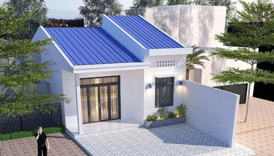 Nhà cấp 4 mái tôn xanh hiện đại, thiết kế tối giản, phù hợp khu phố yên tĩnh, có sân trước rộng rãi và cây xanh.