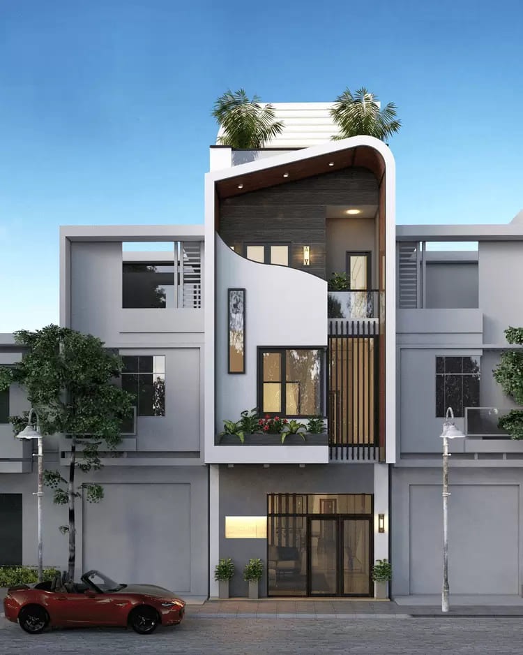 Nhà phố hiện đại 3 tầng với thiết kế độc đáo và cây xanh làm điểm nhấn, xe thể thao đỏ đỗ phía trước.