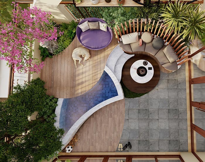 Sân vườn hình chữ Y với ghế sofa, hồ nước nhỏ và cây xanh, tạo không gian thư giãn độc đáo từ trên cao.