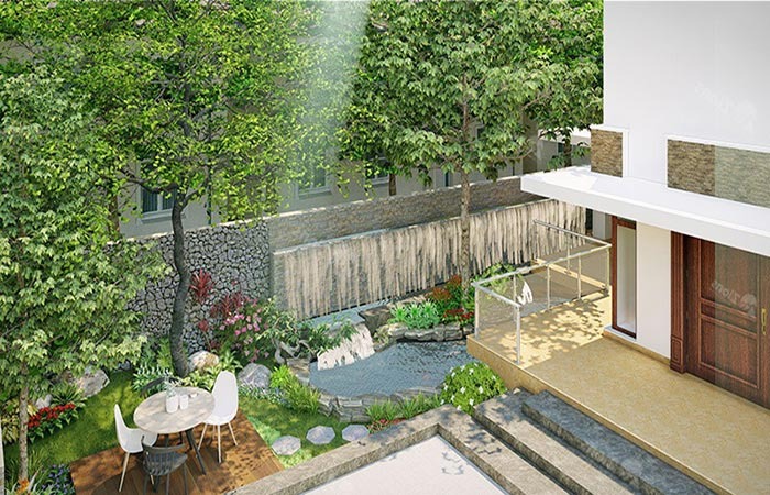 Khu vườn nhỏ xinh với bàn ghế, cây xanh và hồ nước cạnh nhà, thiết kế ngoại thất sân vườn hiện đại.