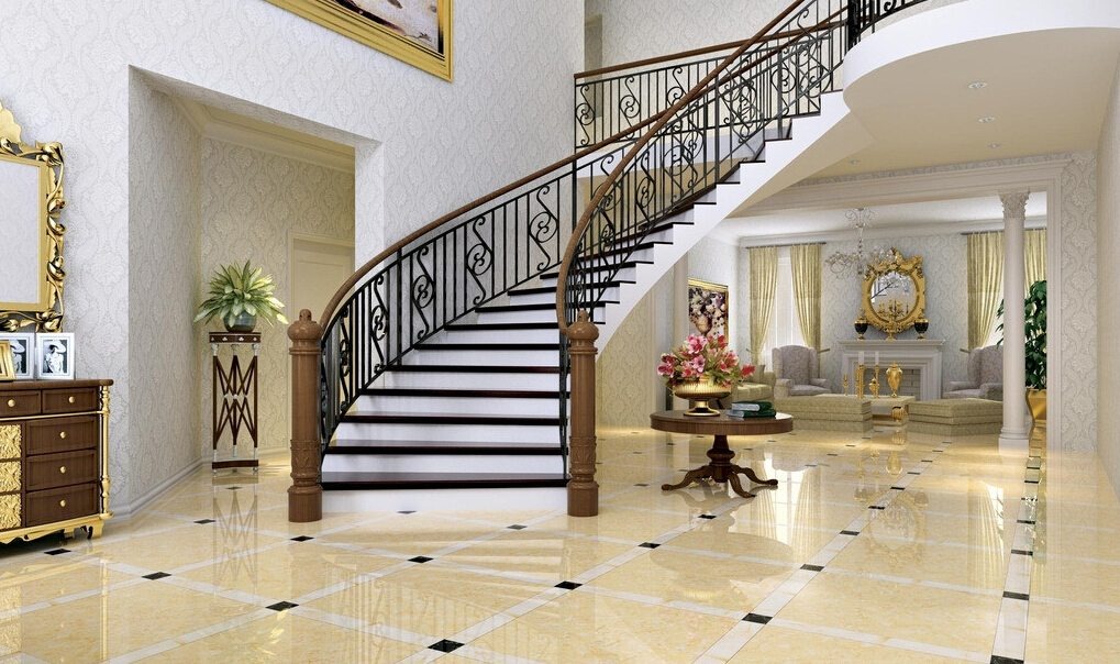 Cầu thang xoắn ốc sang trọng trong phòng khách cổ điển, với sàn đá bóng và nội thất tinh tế.