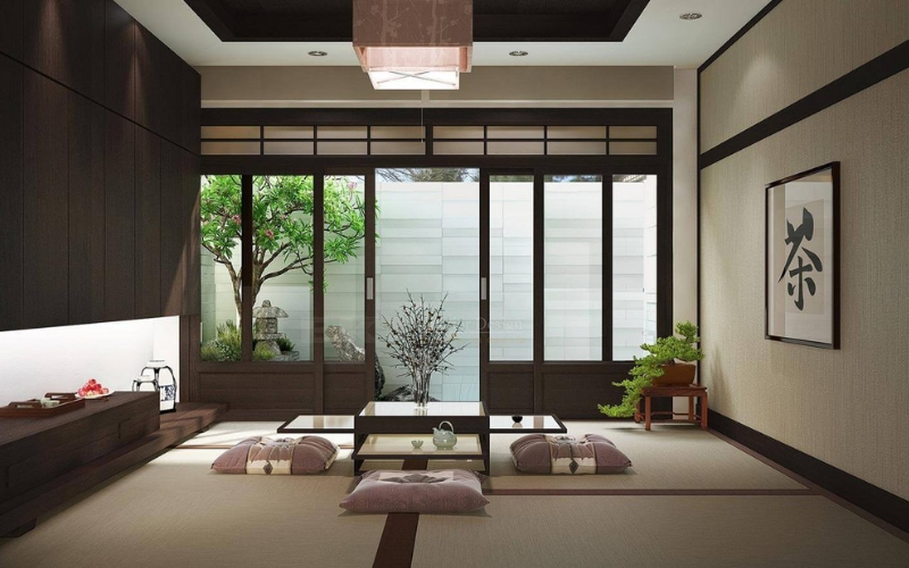 Phòng trà kiểu Nhật với bàn thấp, đệm ngồi, và cửa lùa, nhìn ra khu vườn nhỏ xanh mát.