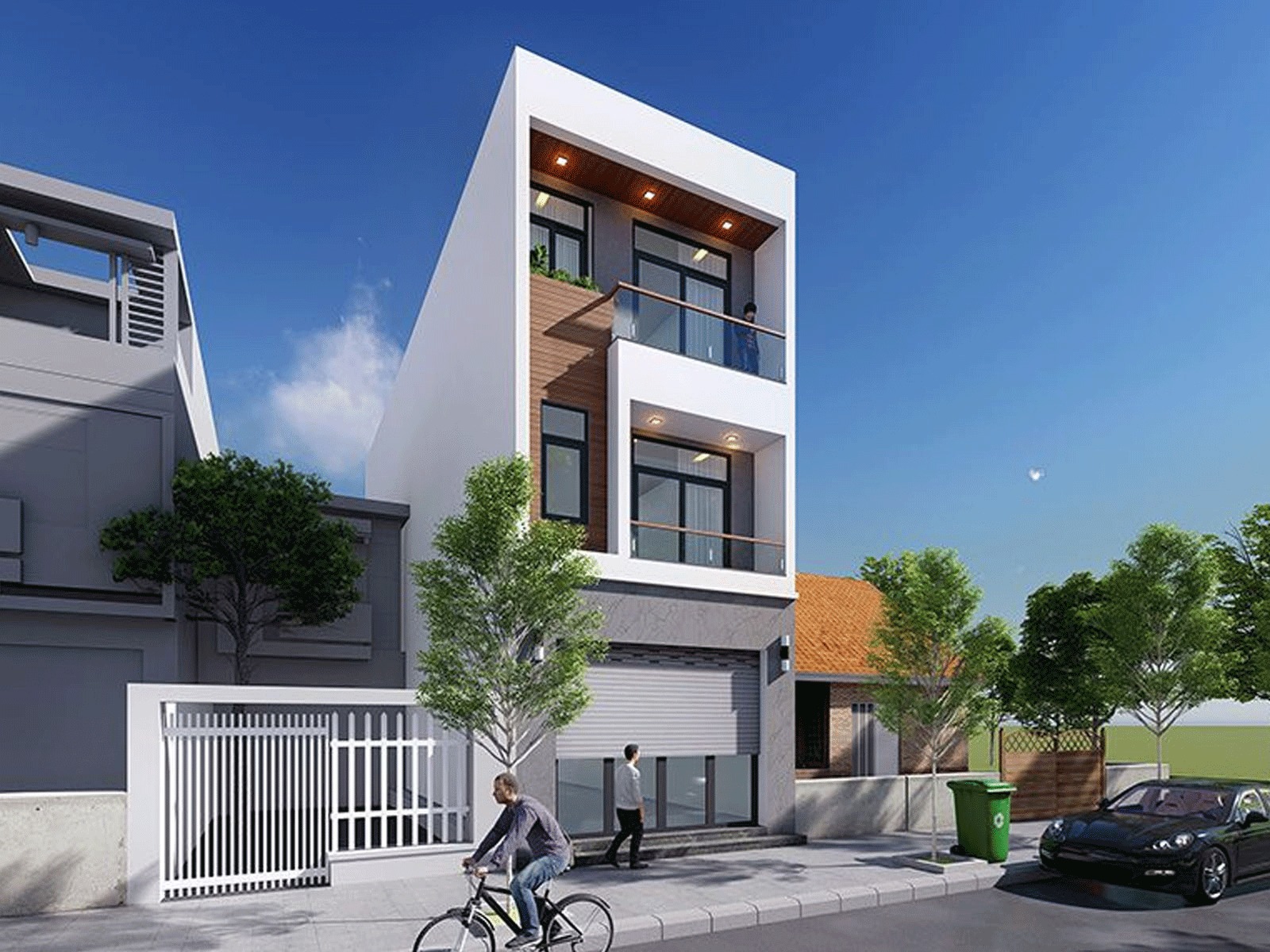 Nhà phố hiện đại ba tầng với cửa kính lớn, cây xanh và xe đạp trên vỉa hè, bầu trời trong xanh.