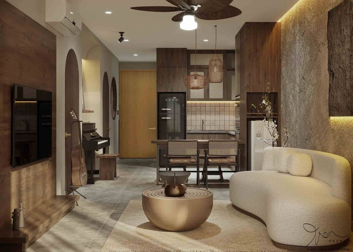 Phòng khách hiện đại với sofa cong, bàn tròn và bếp mở phong cách Á Đông ấm áp.