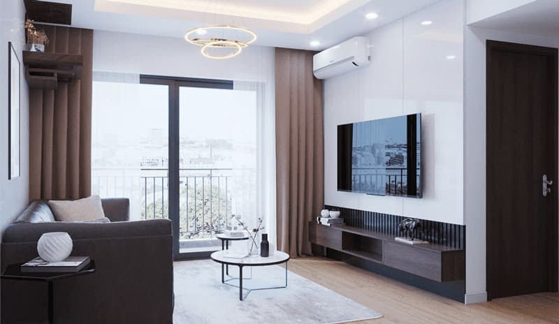 Phòng khách hiện đại với sofa xám, bàn trà, tivi gắn tường và cửa sổ lớn nhìn ra ban công.