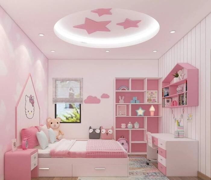 Phòng ngủ trẻ em màu hồng dễ thương với giường và kệ sách, trang trí Hello Kitty và gấu bông.