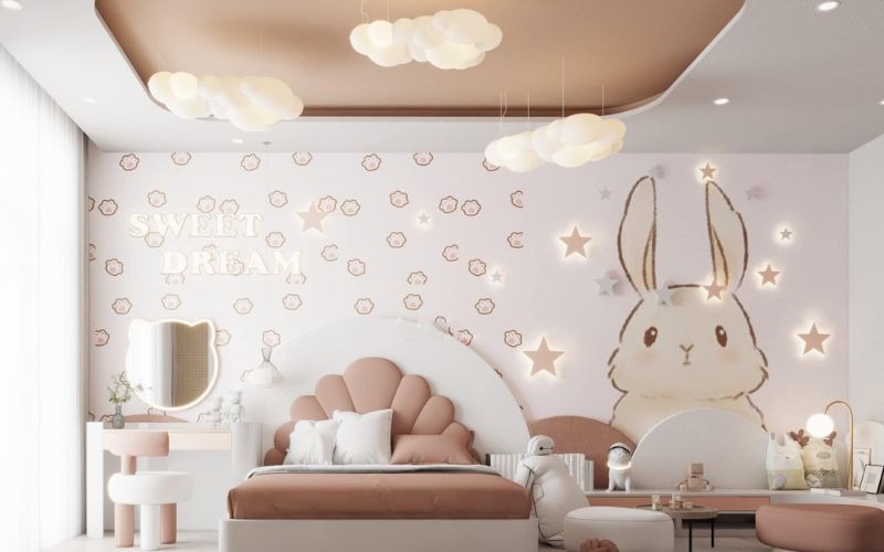 Phòng ngủ trẻ em dễ thương với giường hình cánh hoa, đèn mây, tường trang trí thỏ và chữ Sweet Dream.