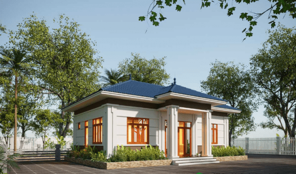 Nhà một tầng hiện đại với mái ngói xanh, xung quanh là cây xanh tạo cảnh quan thiên nhiên yên bình.