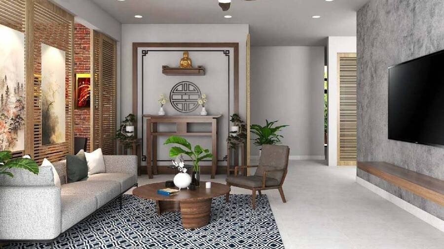 Phòng khách hiện đại với sofa màu xám, bàn gỗ tròn, cây cảnh và tủ thờ, trang trí tối giản.