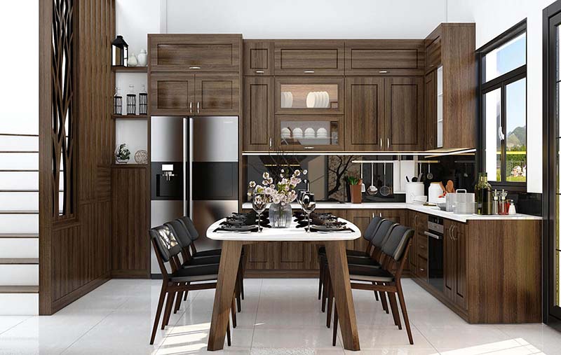 Phòng bếp hiện đại với tủ gỗ, bàn ăn trang trí hoa, ghế đen, thiết kế tinh tế và tông màu nâu ấm áp.