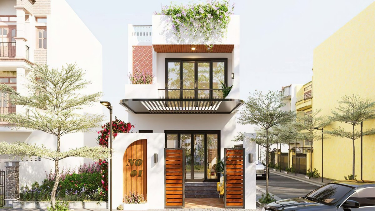 Mặt tiền nhà hiện đại với sân vườn xanh mát và ban công hoa, thiết kế tối giản nhưng sang trọng.