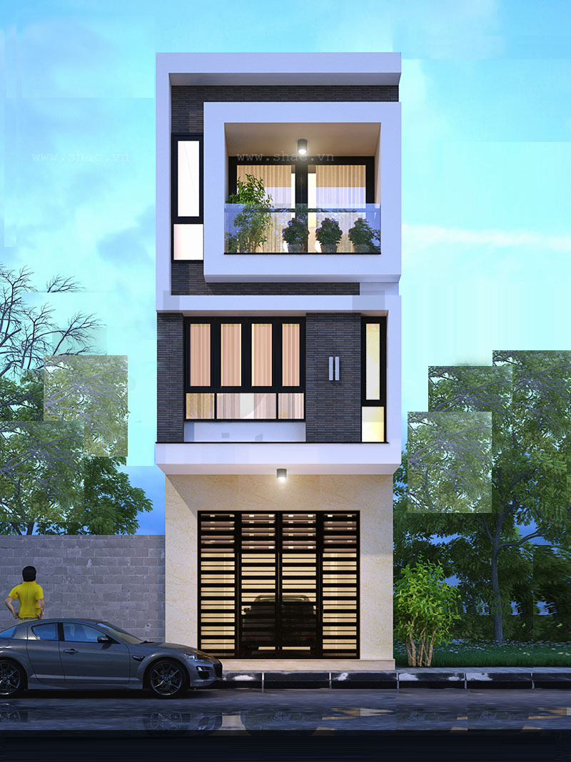 Nhà phố ba tầng kiểu hiện đại với mặt tiền sử dụng kính, cây xanh và ô tô đậu bên ngoài, tượng trưng cho cuộc sống đô thị tiện nghi.